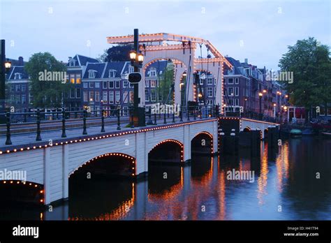 The Netherlands Amsterdam Channel Thin Brug Lighting Dusk Europe