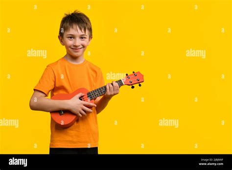 Happy Child 9 11 Yo Play Acoustic Ukulele Guitar School Boy Playing