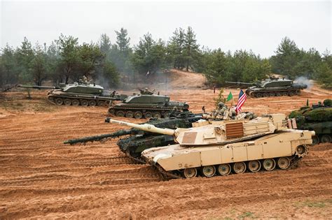 Abrams Tank With Camouflage Stationed In Poland Rtanks