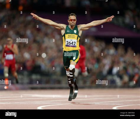 South Africa S Oscar Pistorius Celebrates Winning Gold In A New