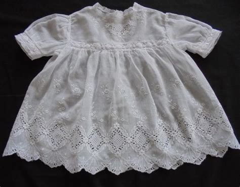 Circa 1930s Baby Dress With White Work Lace Eyelets And Pink Ribbon