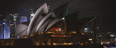 Majestic View Of Sydney Opera House In Australia At Night Among