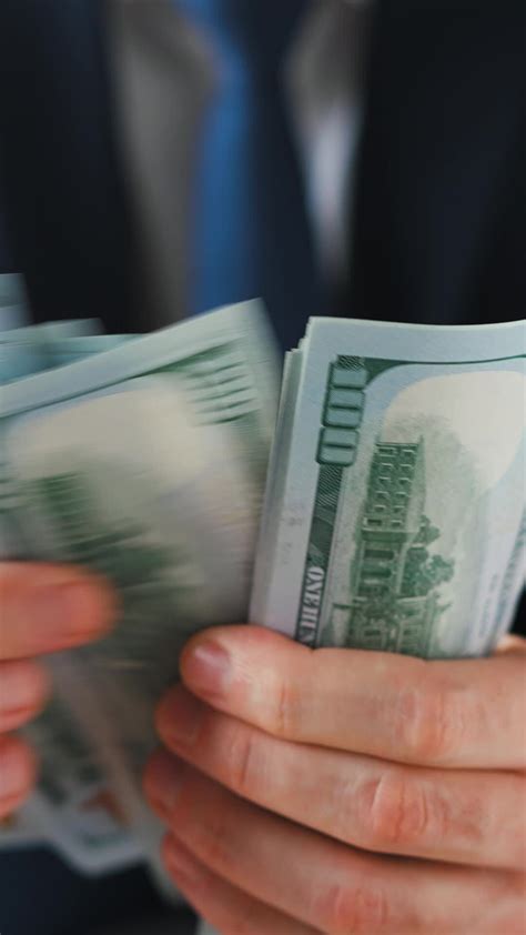 Formally Dressed Man Counting Us Dollar Bills Close Up Stock