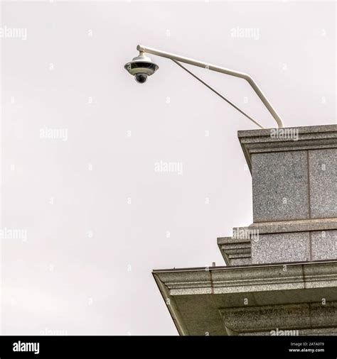 Square Frame Outdoor Cctv Security Camera Installed At The Corner Of