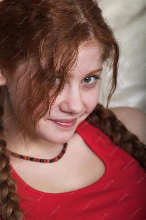 Premium Photo Picture Of Lovely Redhead Girl With Long Braids