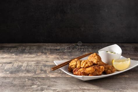 Spicy Chicken Karaage on Wooden Table Stock Photo - Image of karaage ...