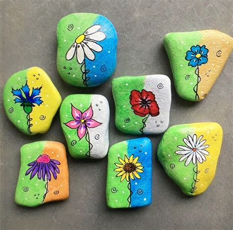 35 Super Colorful Flower Painted Rocks For Inspiration Artofit