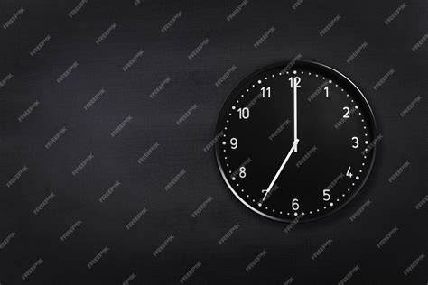 Premium Photo Wall Clock Showing Seven Oclock On Black Chalkboard