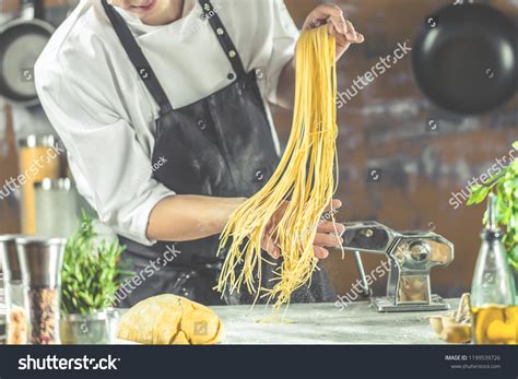 Chef Making Spaghetti Noodles Pasta Machine Stock Photo Edit Now