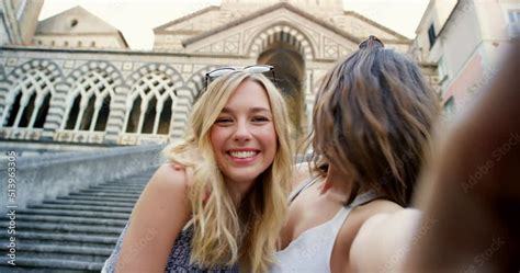 Two Cheerful Young Women Taking Selfies Together Two Women Making