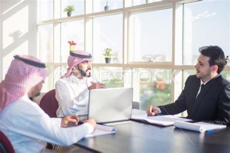 A Saudi Arabian Gulf Work Team A Meeting Of Businessmen To Discuss