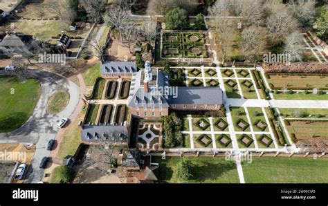 Aerial View Of Governors Palace Featuring Lush Gardens And Trees In