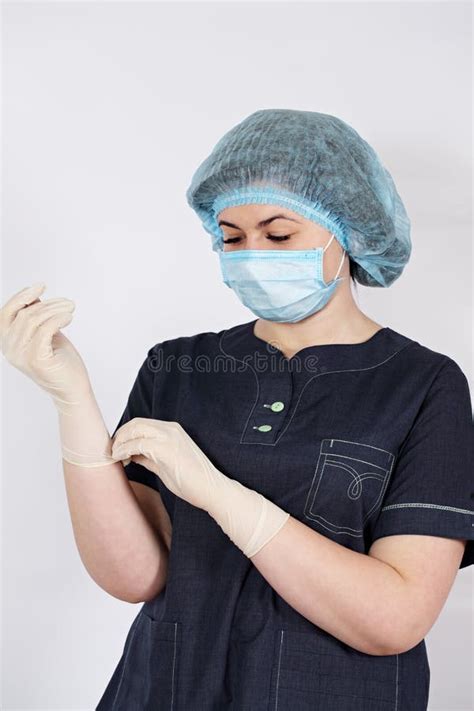 Nurse Puts On Sterile Gloves Stock Image Image Of Knowledge Female