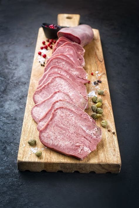 Traditional Cooked Beef Tongue With Cranberries And Pistachios On A