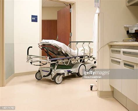 Hospital Corridor With Open Doors Photos and Premium High Res Pictures ...