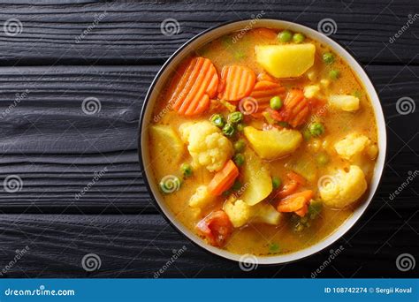 Vegetarian Curry from Vegetables with Coconut Milk Close-up in a Stock Photo - Image of asian ...