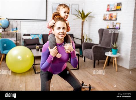 Mother Doing Sports With Her Baby Son Stock Photo Alamy