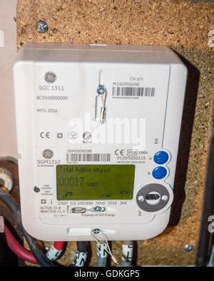 A newly installed EDF GE SGM1312 LCD display smart electricity meter showing reading of 17kWh in ...