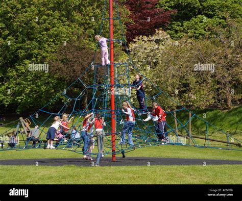 children playing playground [climbing frame] Stock Photo - Alamy