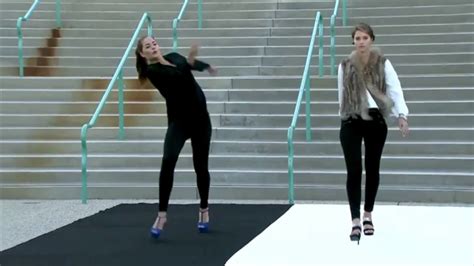 Model Falls Down In High Heels During An Outdoor German Fashion Show