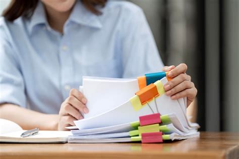 Premium Photo Businesswoman Hands Working In Stacks Of Paper Files