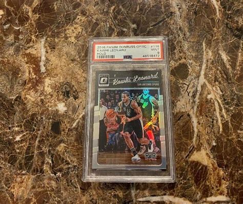 2016 17 PANINI DONRUSS OPTIC KAWHI LEONARD HOLO PRIZM SILVER 116 PSA 9