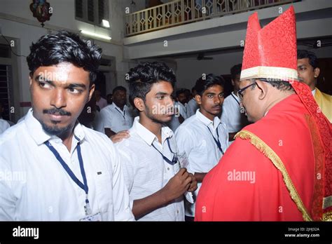 Catholic Bishop Is Giving Confirmation Sacrament Stock Photo Alamy