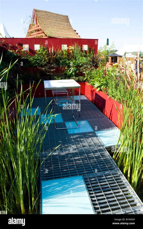 Metal Pathway Over A Garden Pond Stock Photo Alamy