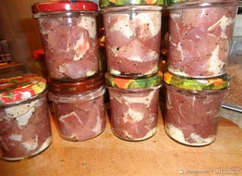 Several Jars Filled With Food Sitting On Top Of A Table