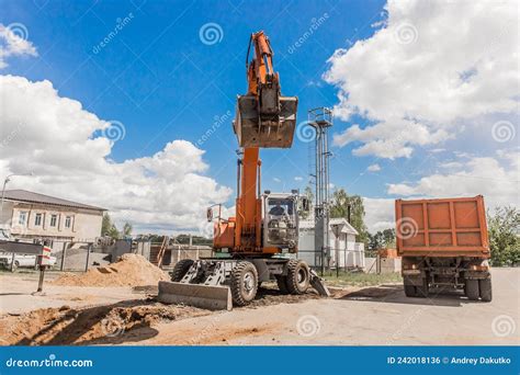 Excavation Works The Bucket Of The Tractor Excavator Machine Loads The