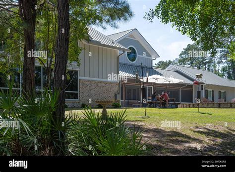 Couple Relaxing On A Beautiful Spring Day At Skidaway Island Visitor