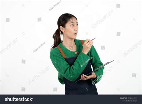 Portrait Smiling Mature Woman Apron Holding Stock Photo Shutterstock