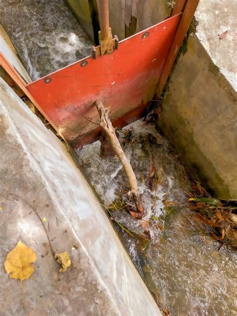 Irrigation Sluice Gate To Channel Water To Farmers` Fields Stock Image
