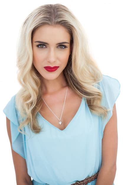 Premium Photo Seductive Blonde Model In Blue Dress Looking At Camera