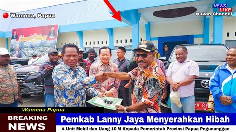 Pemkab Lanny Jaya Menyerahkan Hibah Unit Mobil Dan Uang M Kepada