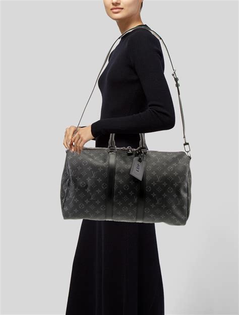 Louis Vuitton Monogram Eclipse Keepall Bandouliere 45 Luggage And Travel Handbags The Realreal