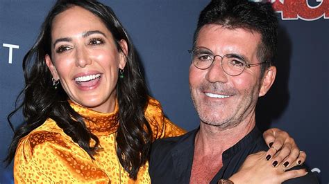 Simon Cowell And Girlfriend Lauren Silverman Share A Kiss In Romantic