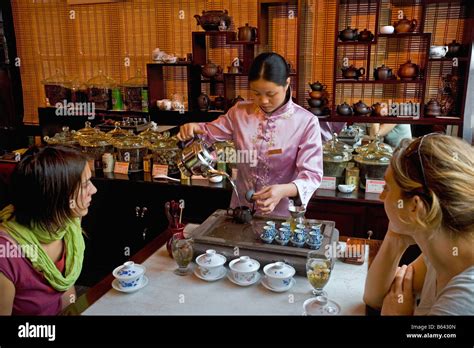 China Shanghai Visitors Having Tea Ceremony In Yuyuan Teahouse Near