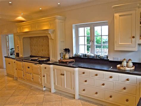 Light White Kitchen With Cream Aga And Wooden Door Furniture A