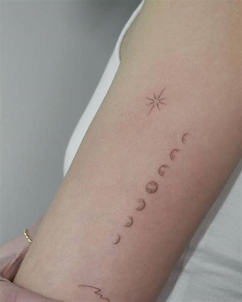 Single Needle Minimalistic Moon Phases Tattoo Located