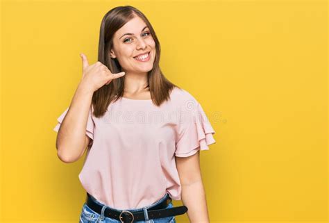 Beautiful Caucasian Woman Wearing Casual Clothes Smiling Doing Phone