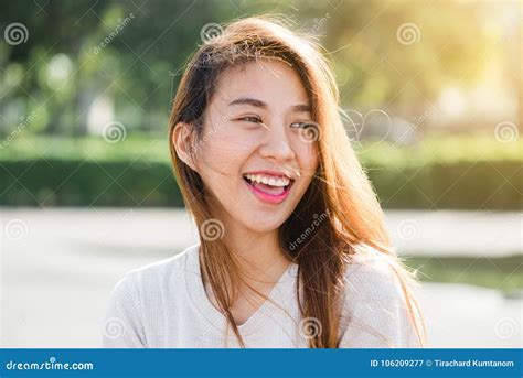 Lifestyle Happy Young Adult Asian Woman Smiling With Teeth Smile