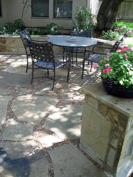 Flagstone Patio With Seat Wall Pea Gravel Used As Grout For Permeable