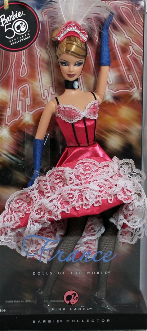 The Barbie Doll Is Wearing A Pink Dress And Tiara