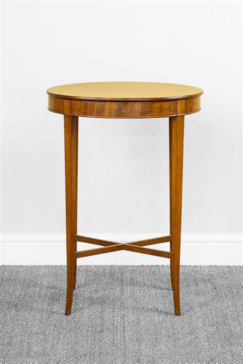 mahogany oval side table number  prop hire company