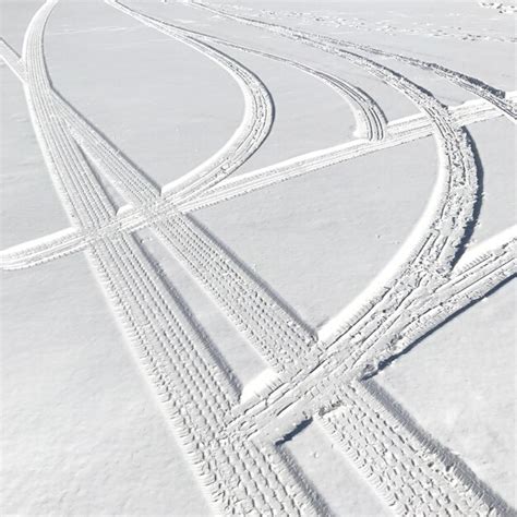 Premium Photo Full Frame Shot Of Tire Tracks On Snow