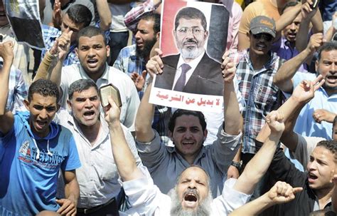 Seguidores Y Opositores De Morsi Se Enfrentan En Egipto