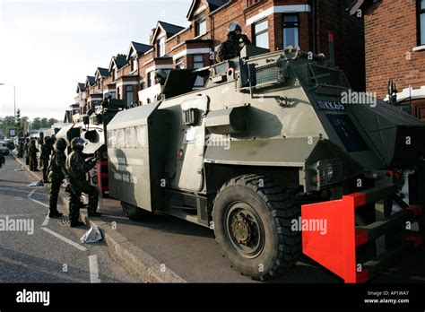 British Army Armoured Saxon Personnel Carrier Vehicle On Crumlin Road