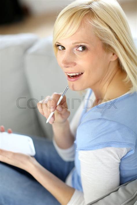 Cheerful Girl Using Smartphone Sitting Stock Image Colourbox