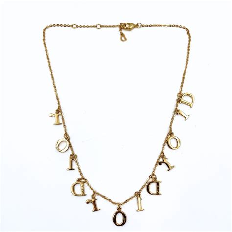 Dior Christian Dior Logo necklace in golden metal | Grailed